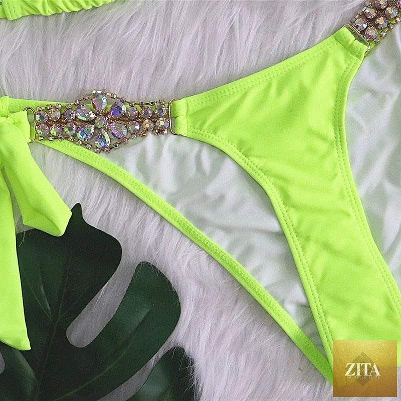 Luxury purple crystal diamond bikini for women, halter style with rhinestones, low waist tie sides, two-piece swimwear by Stevvex.