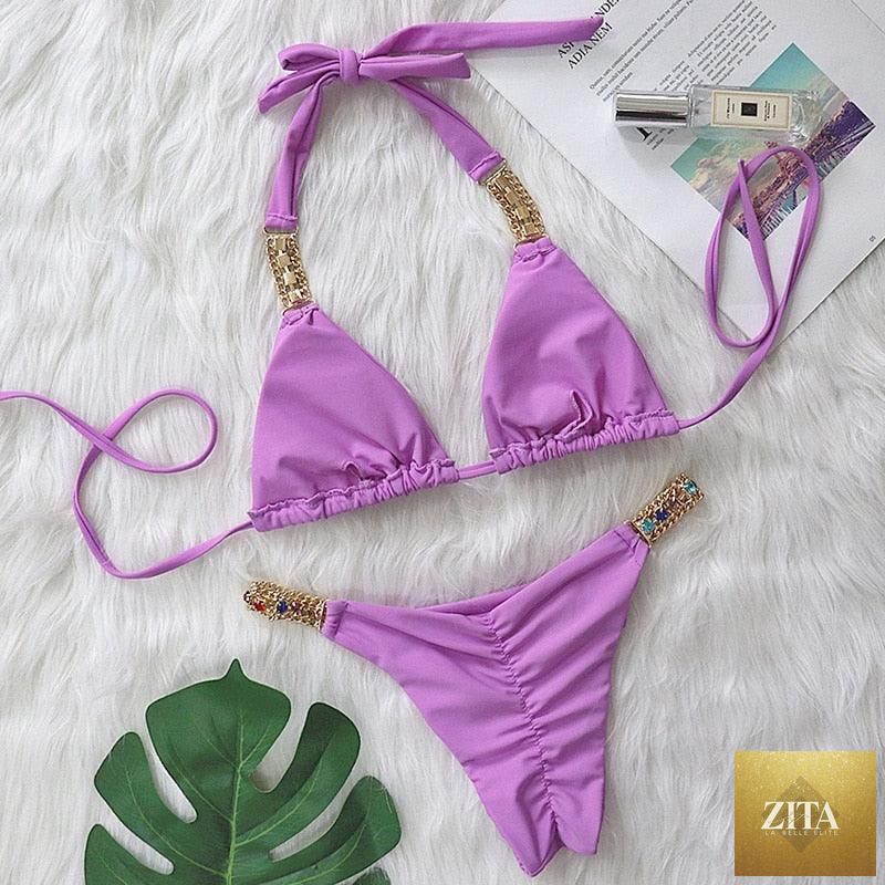 Luxury purple crystal diamond bikini set for women, halter style with low waist and rhinestone details, by Stevvex.