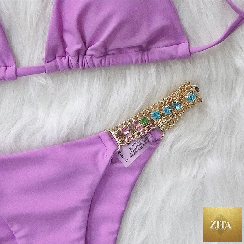 Luxury purple crystal diamond bikini set for women, halter style with low waist, rhinestone accents, and tie side design by Stevvex.