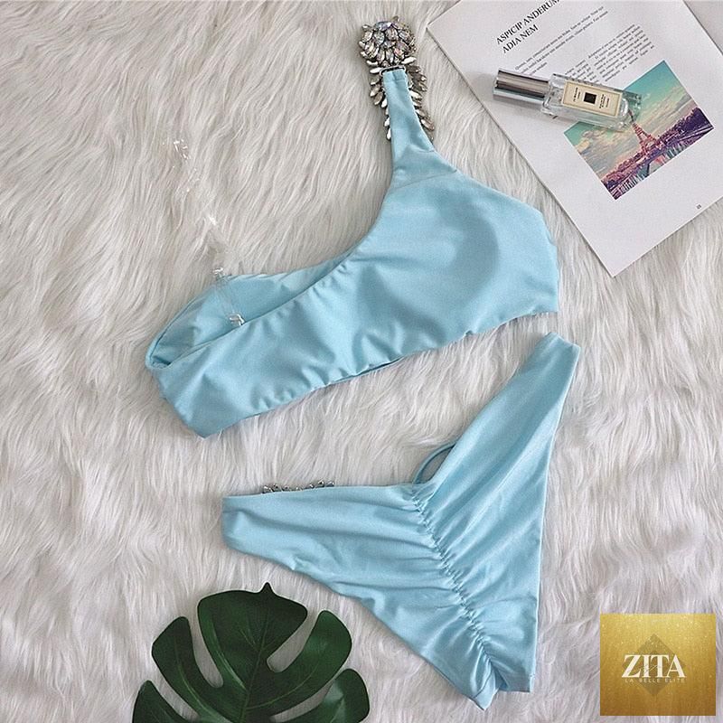Stevvex luxury purple crystal diamond bikini for women, halter style with rhinestones, low waist, tie side, two-piece swimwear.
