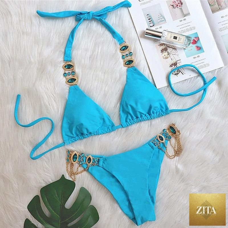 Luxury purple crystal diamond bikini for women, halter style with low waist, tie sides, and rhinestone embellishments.