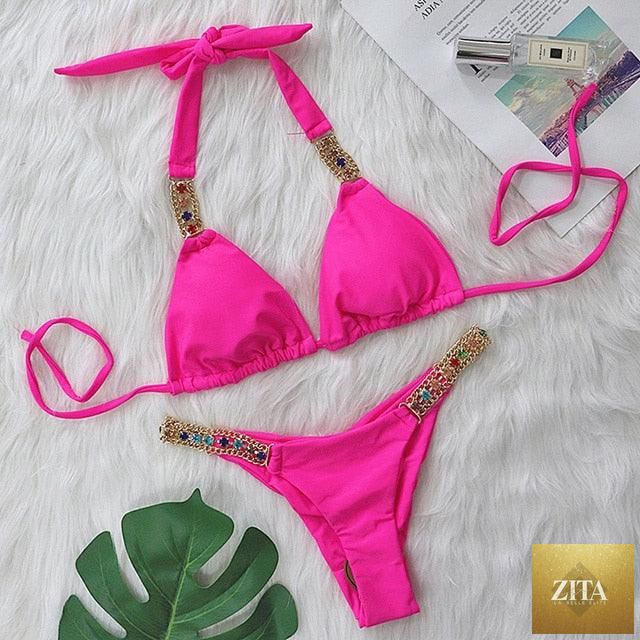 Luxury purple crystal diamond bikini set for women, halter style with low waist and tie side design, featuring rhinestone embellishments.