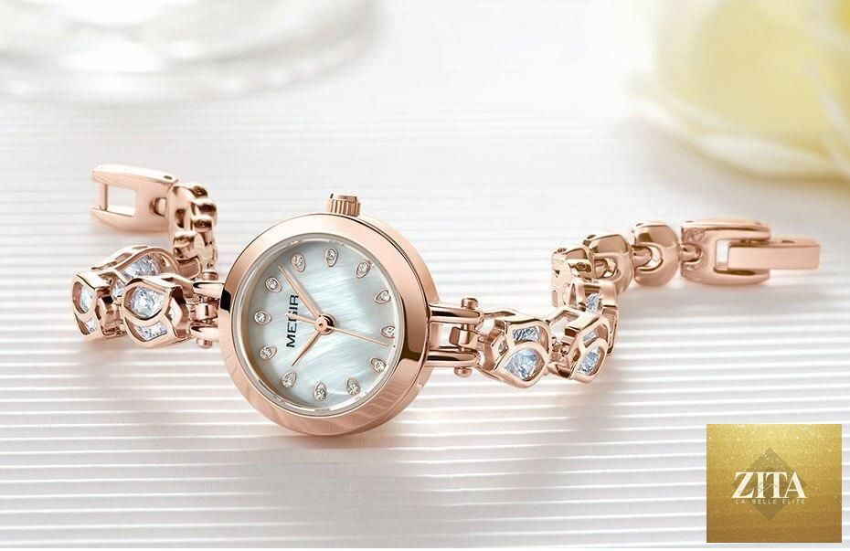 Elegant women's Stevvex crystal fashion watch with a bracelet strap, luxury design, quartz movement, and waterproof features.