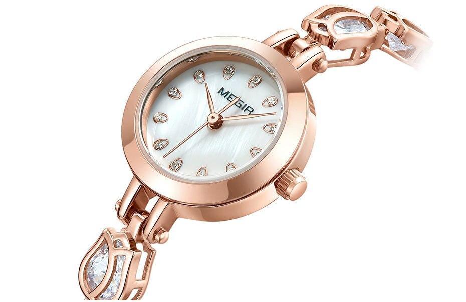 Elegant women's Stevvex crystal quartz watch with a bracelet strap, waterproof design, and luxurious style.