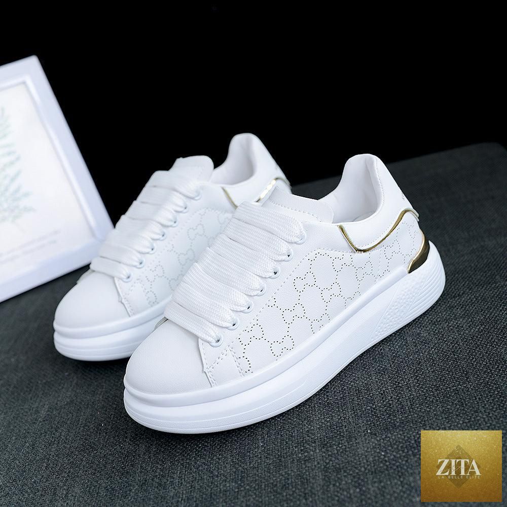 Stevvex women's white thick-soled sports shoes with breathable material, lace-up design, ideal for casual, gym, and running activities.