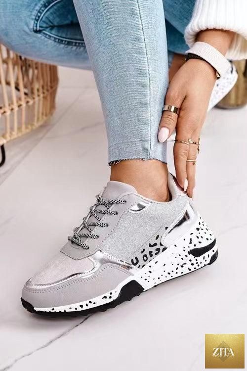 Leopard print Stevvex women's sport running sneakers with breathable fabric, lace-up design, and height-increasing sole for walking and jogging