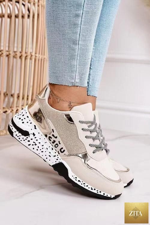 Stevvex women's leopard print sport running sneakers with lace-up design, breathable material, and height-increasing sole for walking and jogging.