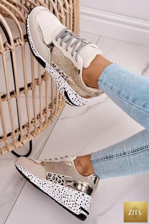 Stevvex women's leopard print sport running sneakers with breathable material, lace-up design, and height-increasing sole for walking and jogging