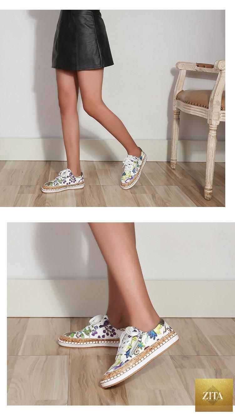 Stevvex women's white casual sneakers with colorful flower print, lace-up design, suitable for summer walking and everyday wear.