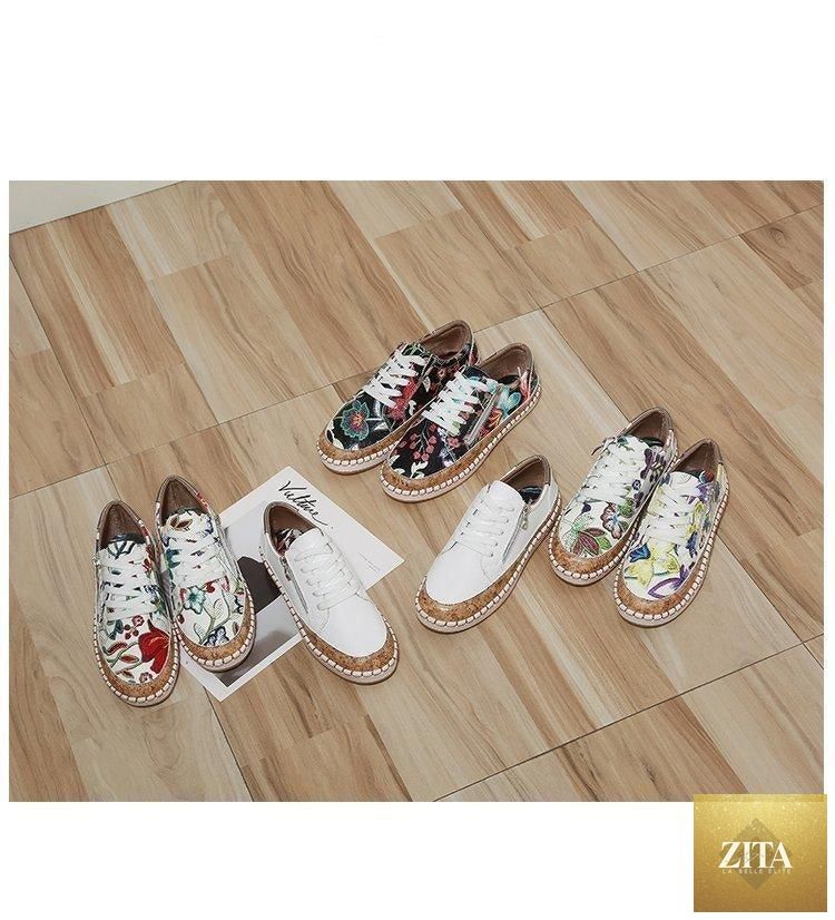 Women's white casual sneakers by Stevvex featuring colorful floral print, lace-up design, flat sole, perfect for summer walking and sports.