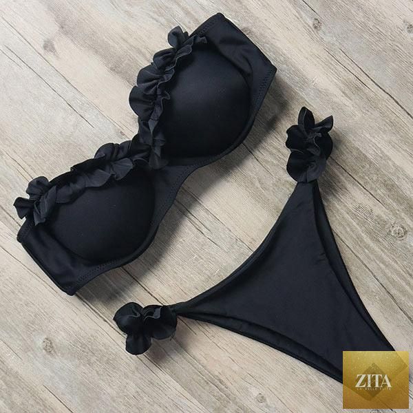 Stevvex leopard bikini set for women, halter triangle top with cheeky bottoms, perfect for summer beachwear and swimming.