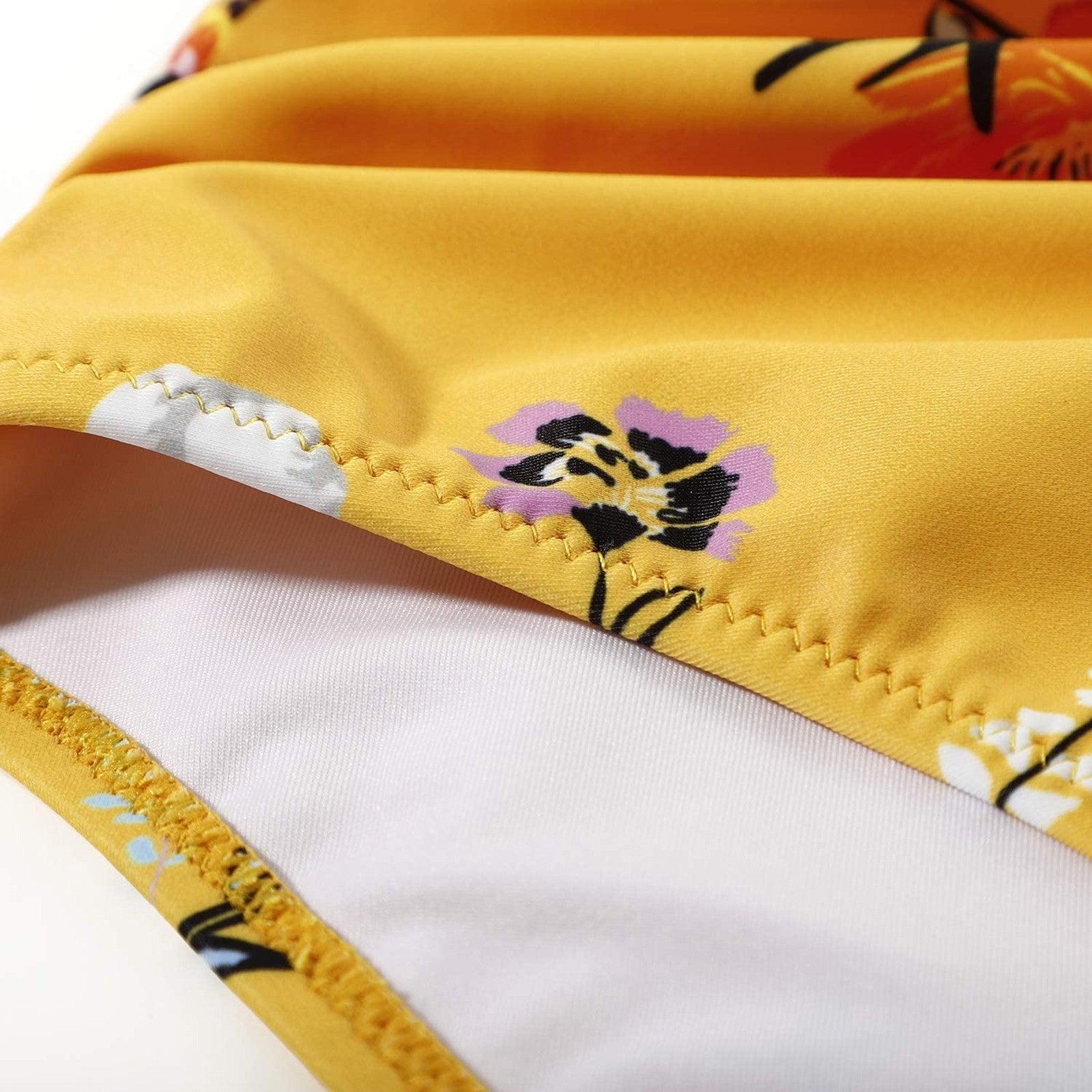 Stevvex modern floral bikini set with high waist crisscross design and string ties, featuring colorful flower print for summer beachwear.