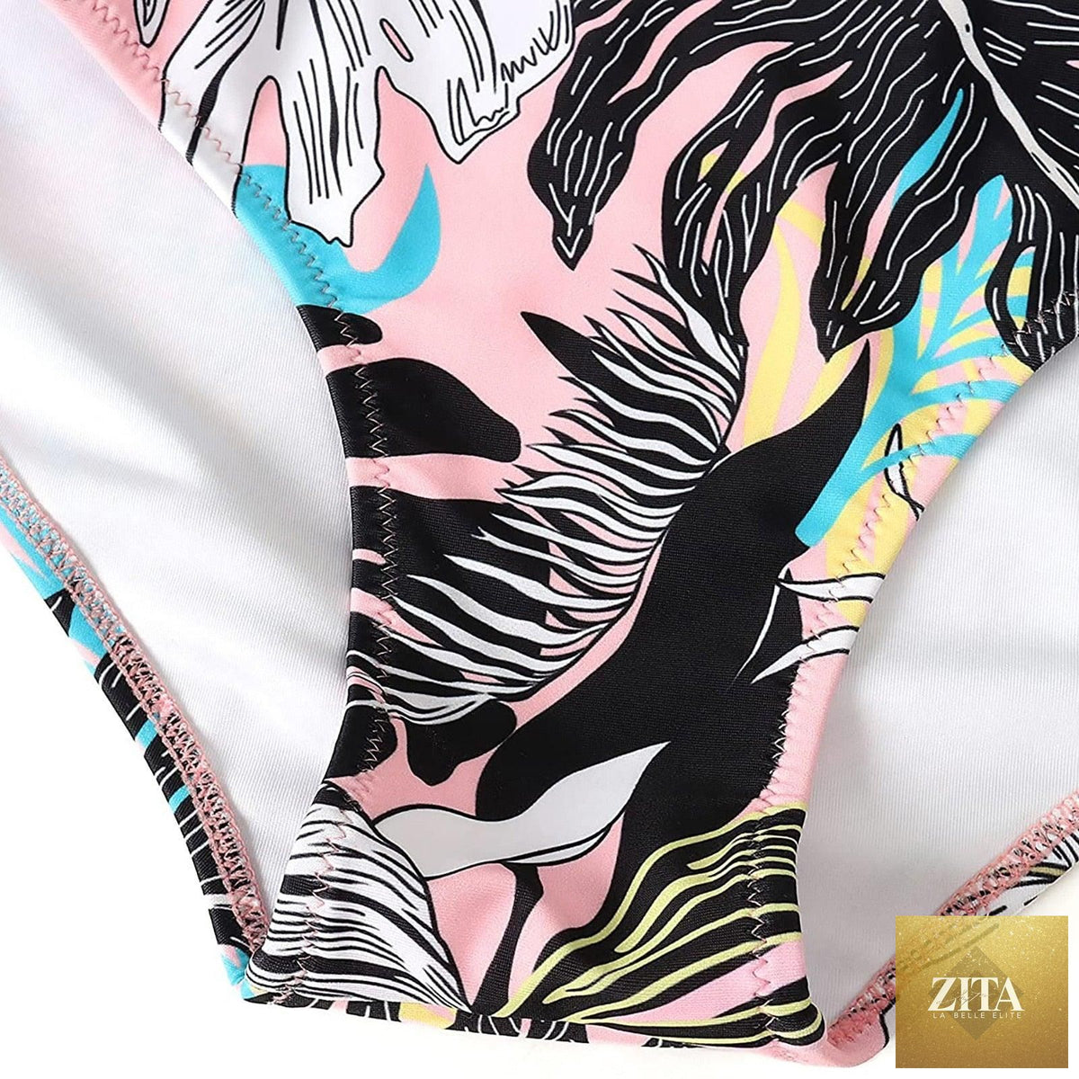 Stevvex women's modern floral bikini set with high waist, crisscross design, and string ties, featuring colorful flower print.