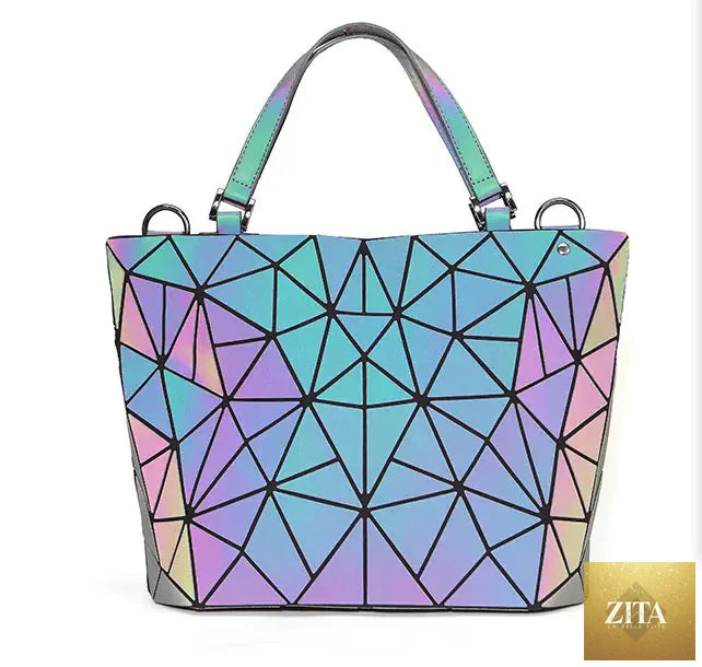 Geometric laser-cut women's handbag and crossbody bag with bold design, black and white pattern, Trendy Attic Store01.