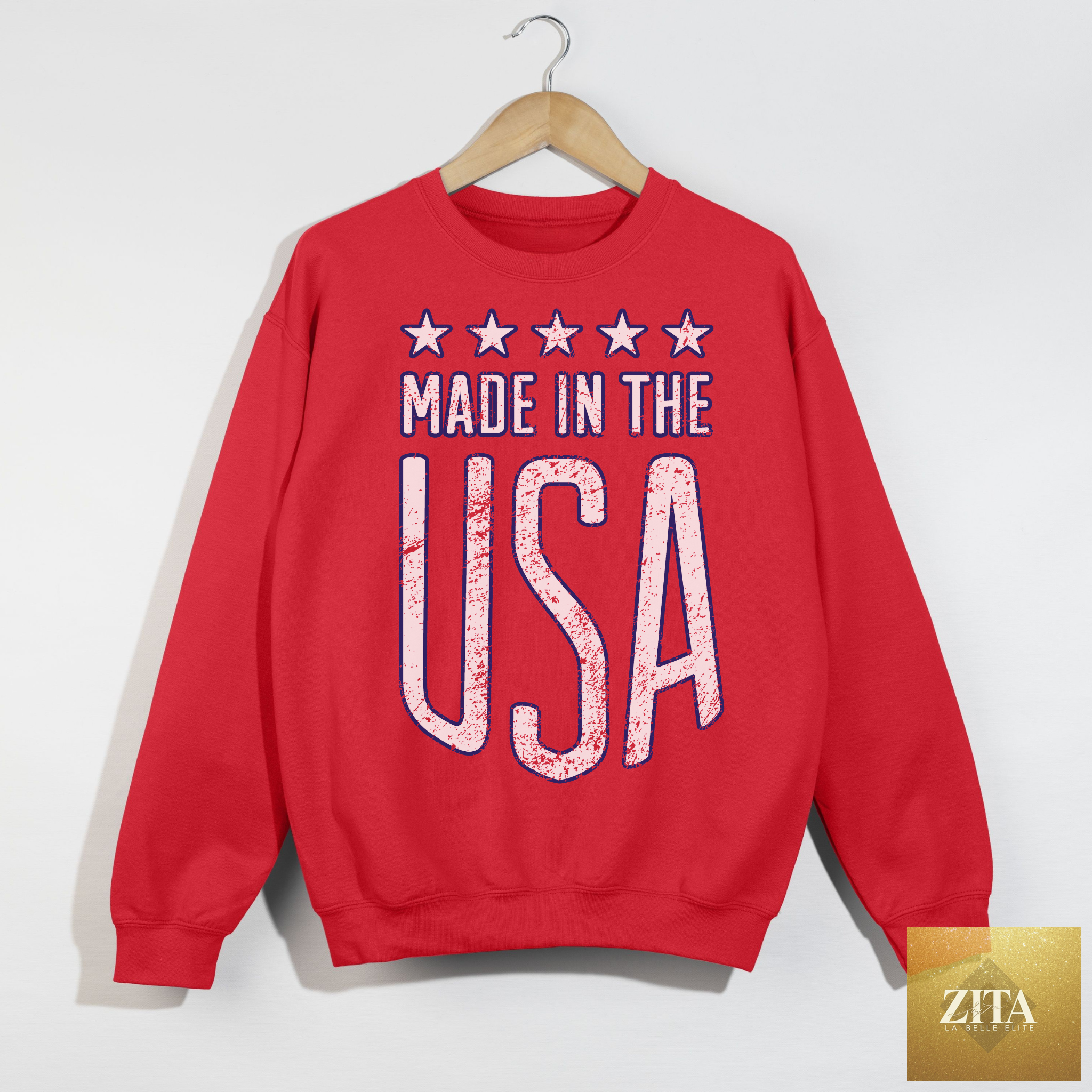 Red made in USA sweatshirt featuring patriotic graphic design and vintage USA print, by Hey Jude Graphic Tees.