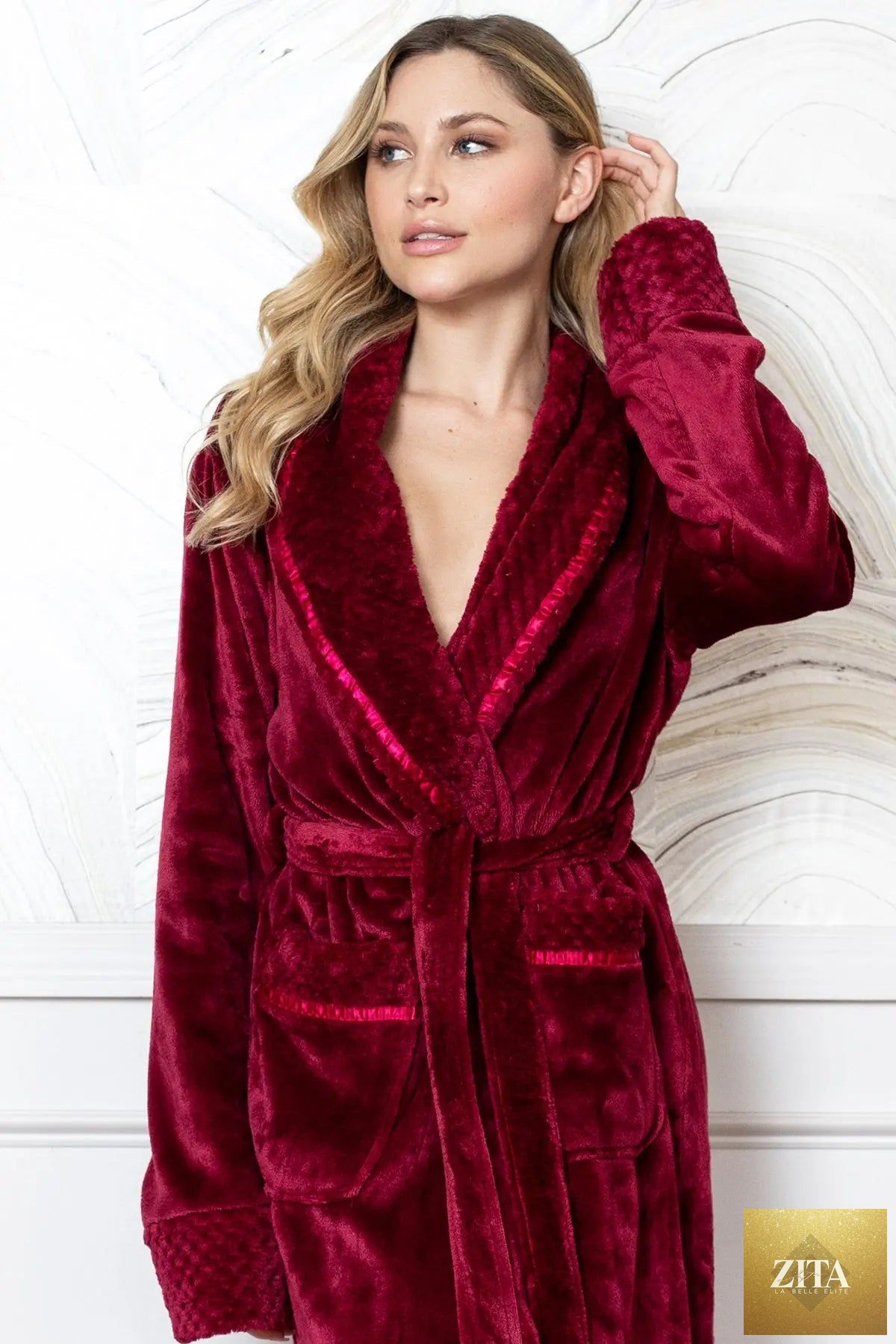 Red women's ultra-soft plush bathrobe from Lotus Linen, featuring a cozy, comfortable robe with a relaxed fit and plush fabric.