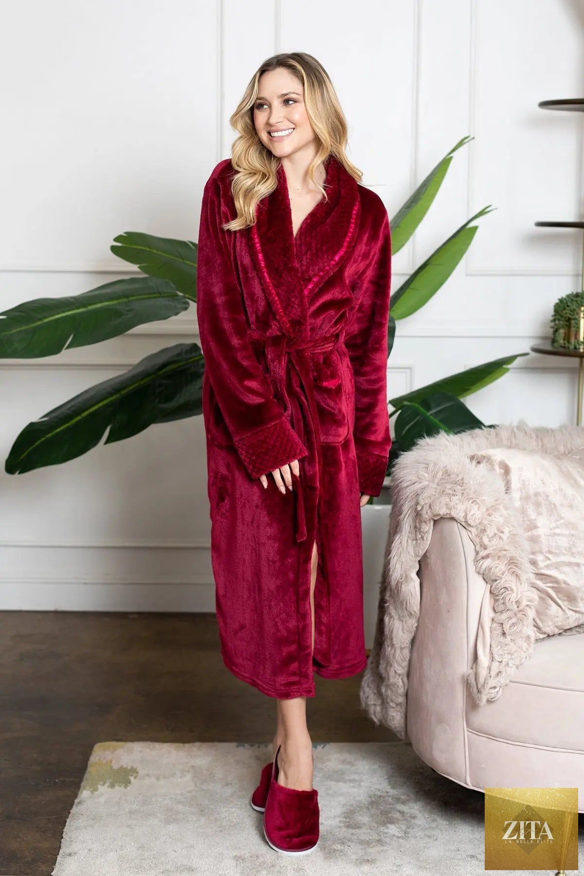 Red plush bathrobe for women by Lotus Linen, ultra soft and cozy, perfect for relaxing at home.