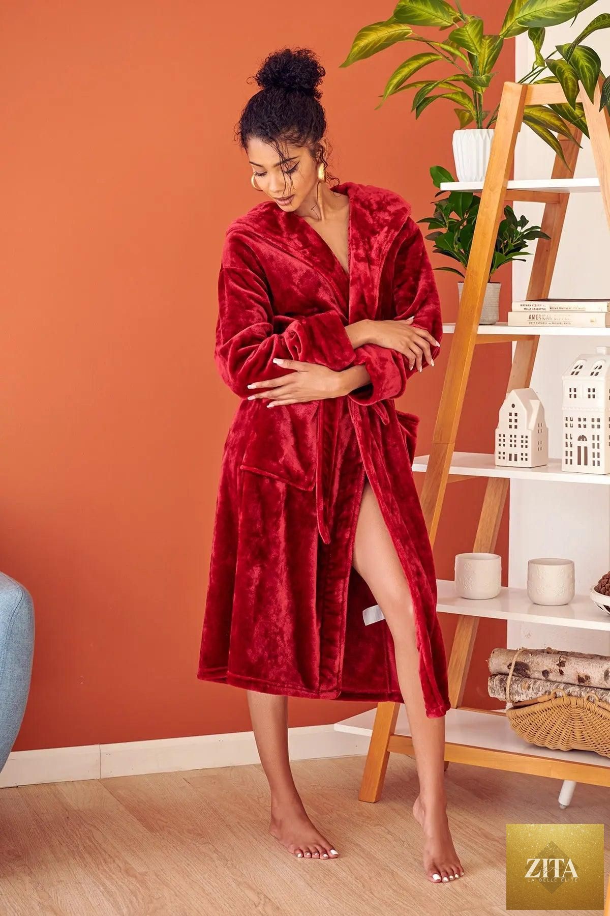 Red women's plush hooded robe by Lotus Linen, featuring soft, cozy fabric and a comfortable hood for spa-like relaxation at home.