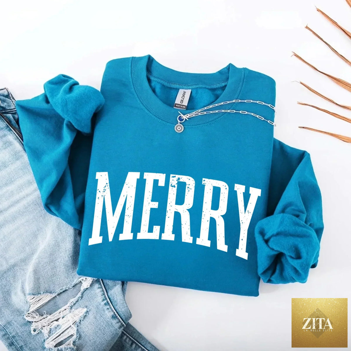 Women wearing a retro Merry Christmas sweatshirt by Adorb Custom Tees, featuring festive holiday design in bright colors.