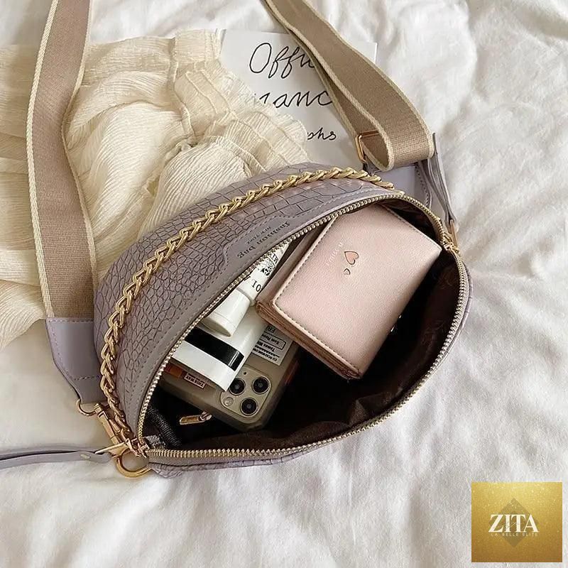 Stevvex retro PU leather waist bag with gold chain strap, stylish fanny pack and multifunctional chest belt bag for women.