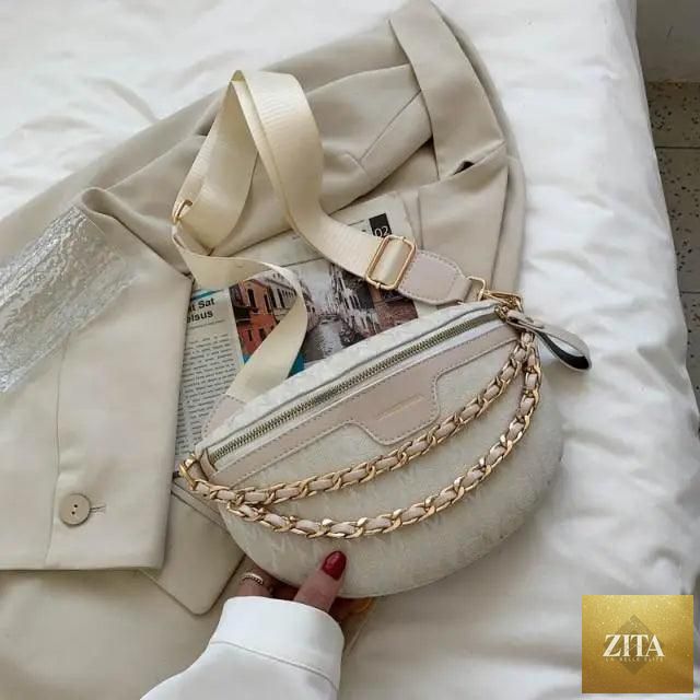 Stylish retro waist bag by Stevvex featuring PU leather, gold chain strap, multifunctional design, and versatile chest or belt pack.