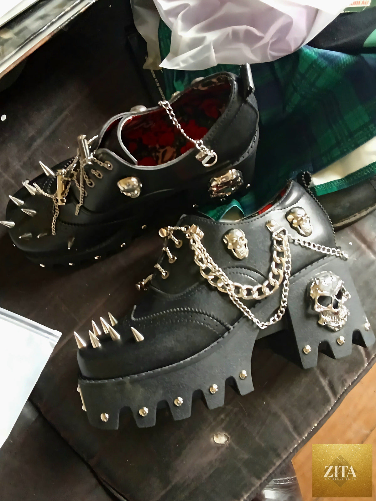 Women's skull shoes with spikes by donjohnbyvictoriacharles, featuring a bold design and edgy details on the footwear.