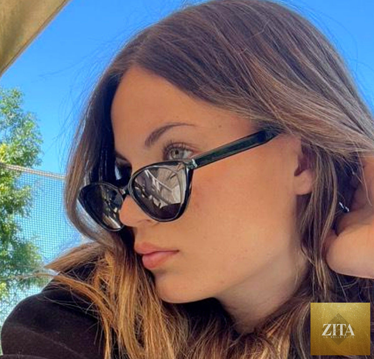 Charlotte Summers sunglasses with stylish frames and tinted lenses, showcasing a fashionable accessory for sun protection.