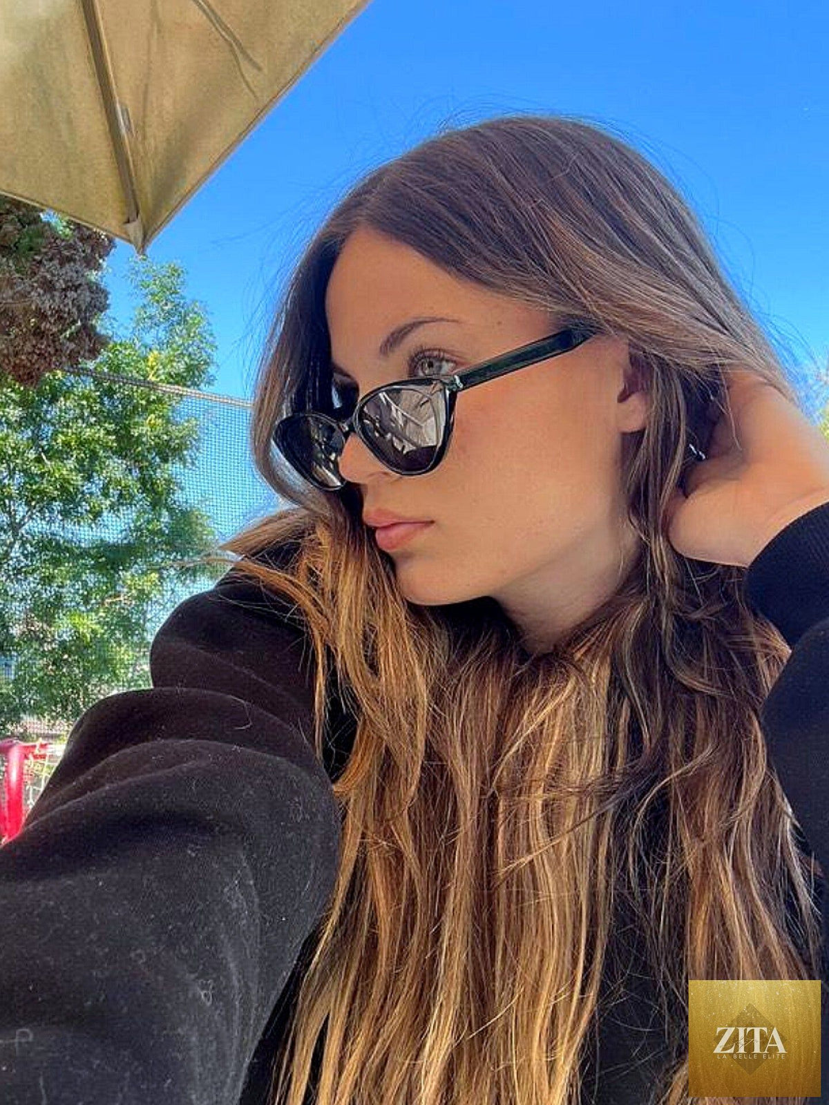 Charlotte Summers sunglasses by donjohnbyvictoriacharles featuring stylish tinted lenses and a sleek frame design.