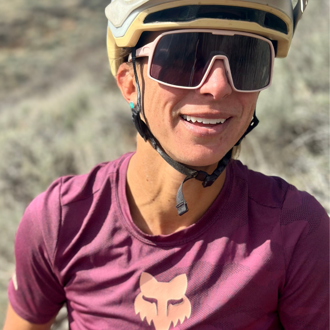 Eastern Outer Mojave sunglasses with photochromic lenses, featuring rose-colored frames and lens detail.