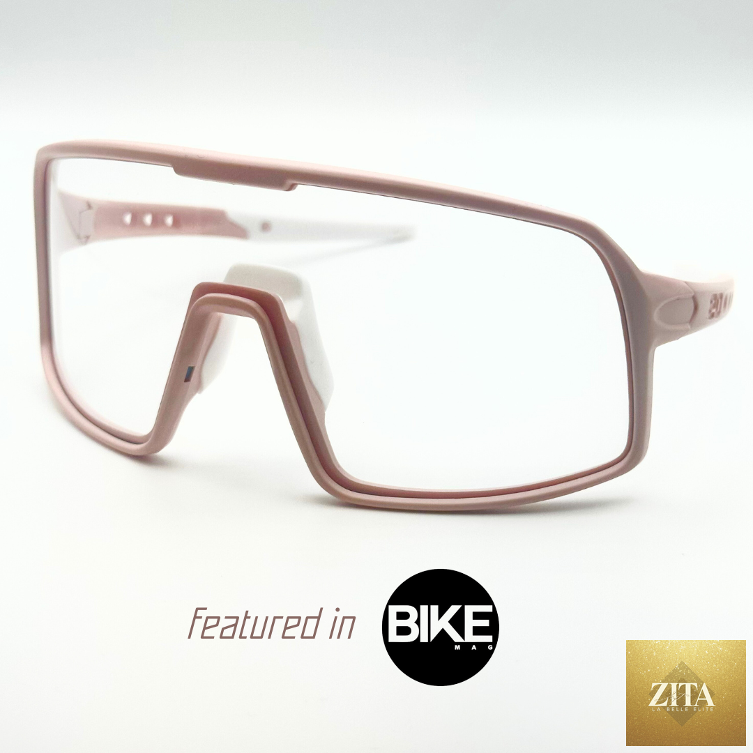 Eastern Outer Mojave sunglasses with photochromic lenses, rose-tinted frame, shown from a left angle.