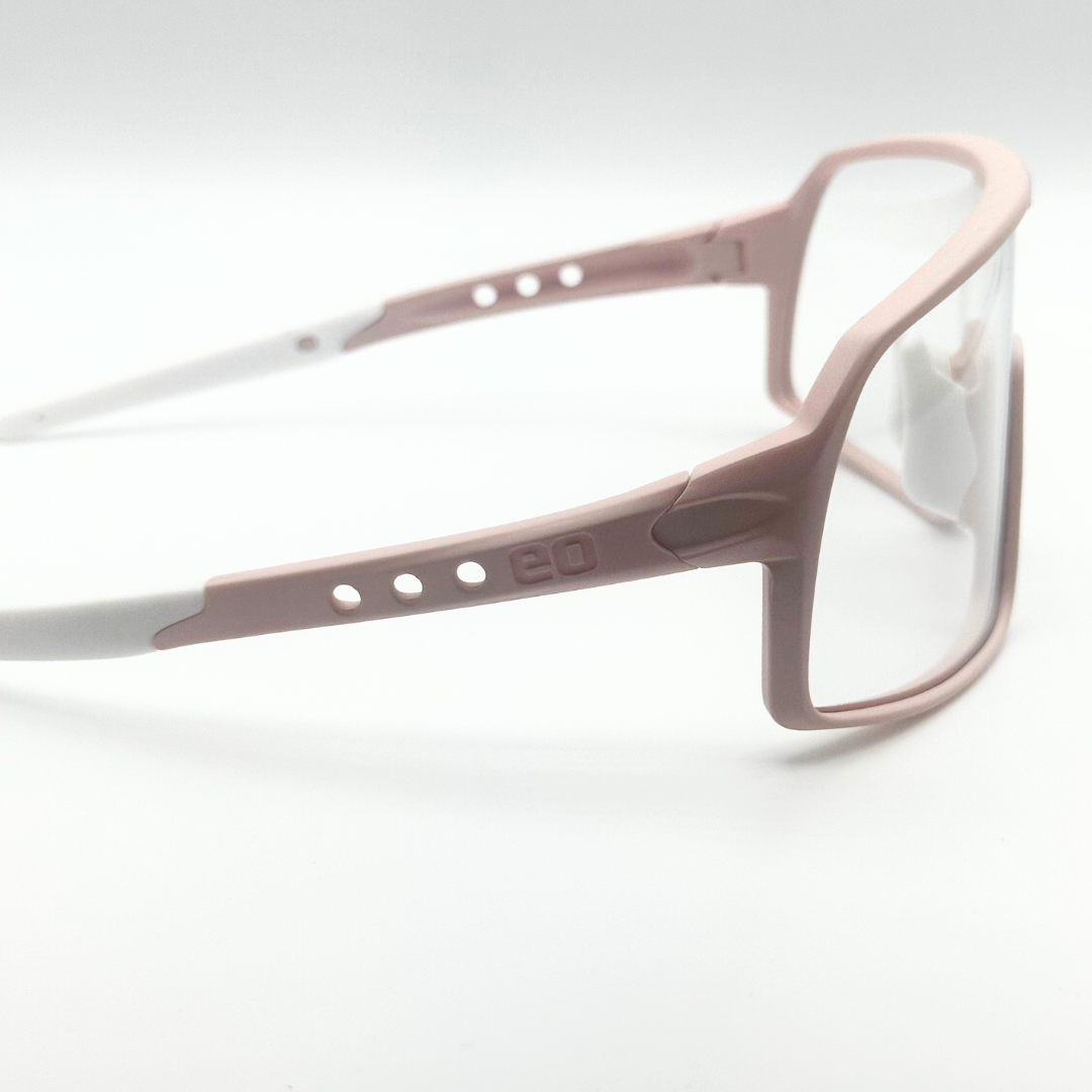 Eastern Outer Mojave sunglasses with photochromic lenses, rose-colored frame in profile view.