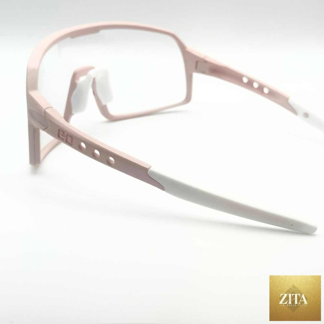 Eastern Outer Mojave sunglasses with photochromic lenses, rear angle view showing rose-colored frame and lens details.