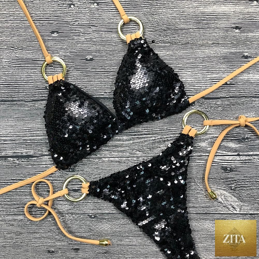 Shiny solid bikini swimsuit with halter top and micro string bottoms, featuring sequin embellishments, perfect for summer beach wear.