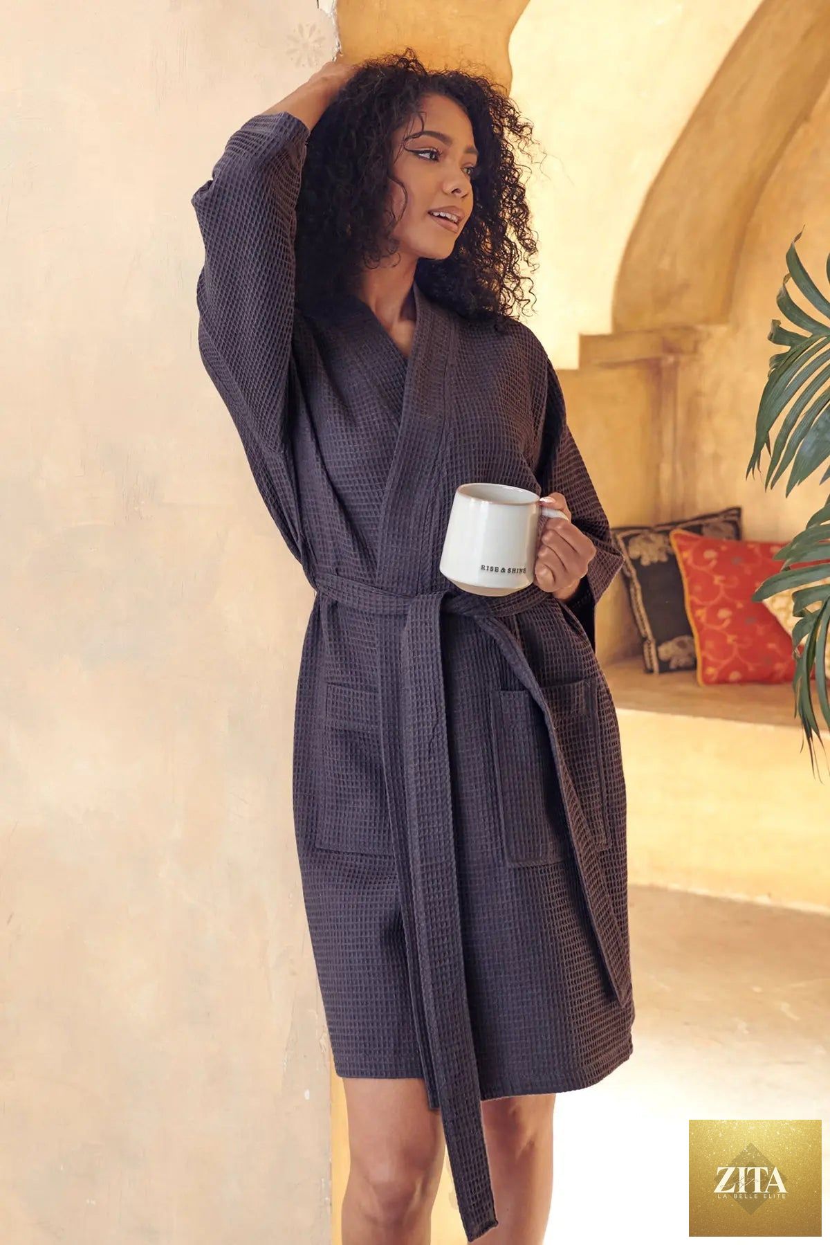 Knee-length women's waffle robe by Lotus Linen, soft and cozy robe with a textured waffle pattern, perfect for relaxing at home.
