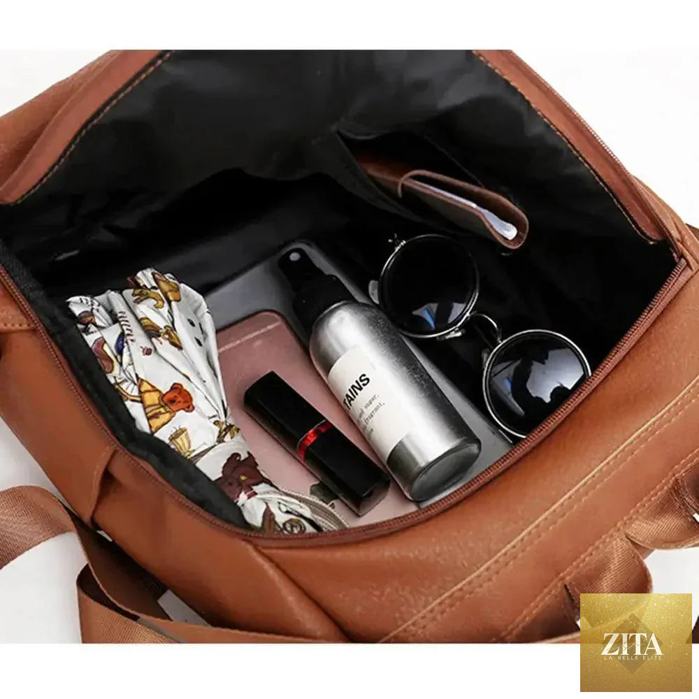 Elegant genuine leather handbag by Stevvex featuring vintage style, anti-theft design, suitable for teenage girls and women travel or school use.