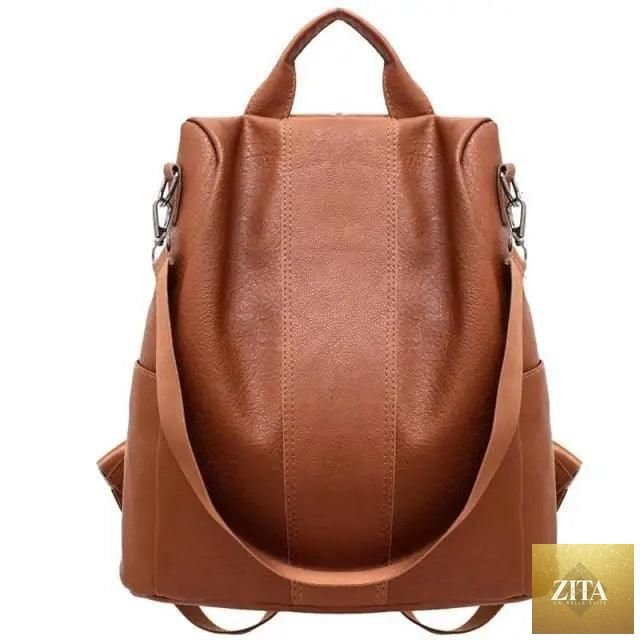 Elegant genuine leather Stevvex vintage-style anti-theft backpack for teenagers and women, ideal for school and travel use.