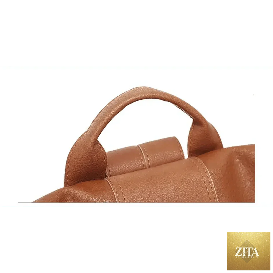 Elegant genuine leather Stevvex vintage-style anti-theft backpack for women and teenagers, ideal for school, travel, and everyday use.
