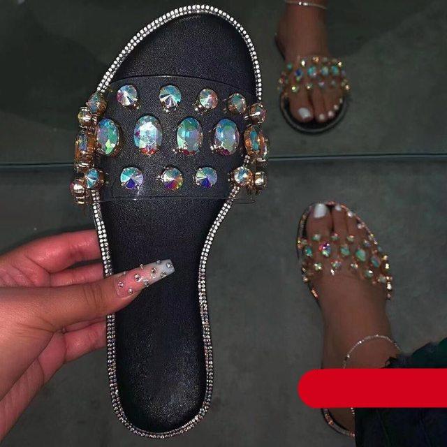 Stevvex women's open-toe flat sandals with clear rhinestones, casual slip-on flip flops perfect for parties and everyday wear.
