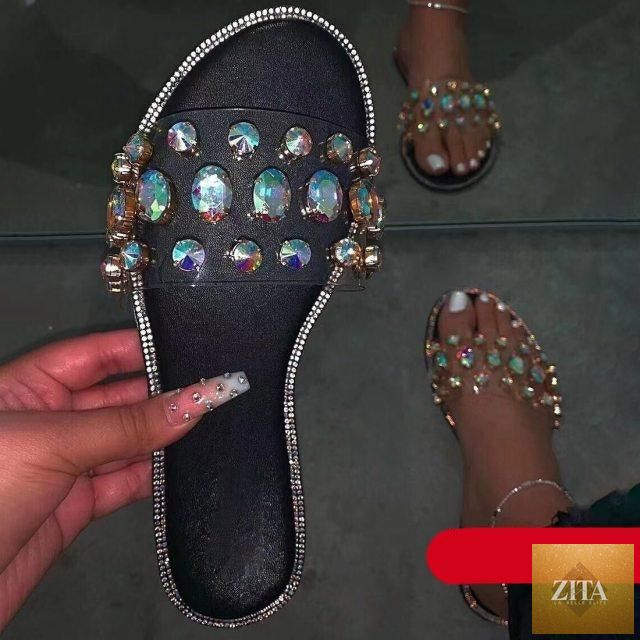 Stevvex women's flip flops with open toe design, clear rhinestones, and flat casual style for comfortable summer wear.