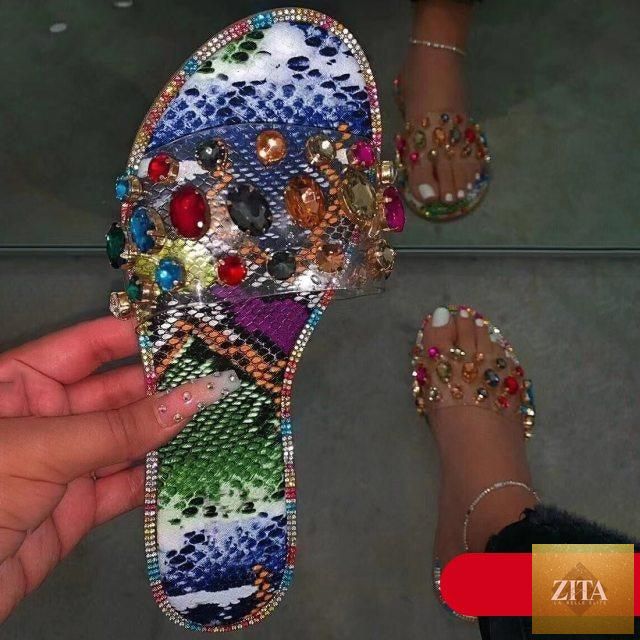 Stevvex women's open-toe flip flops with clear rhinestones, flat slip-on sandals, casual and party footwear with diamond accents.