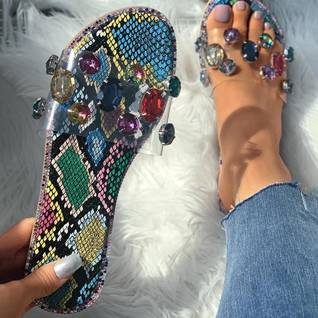 Stevvex women's rhinestone flip flops with open toe, flat slide design, clear rhinestones, casual slip-on style, perfect for parties.