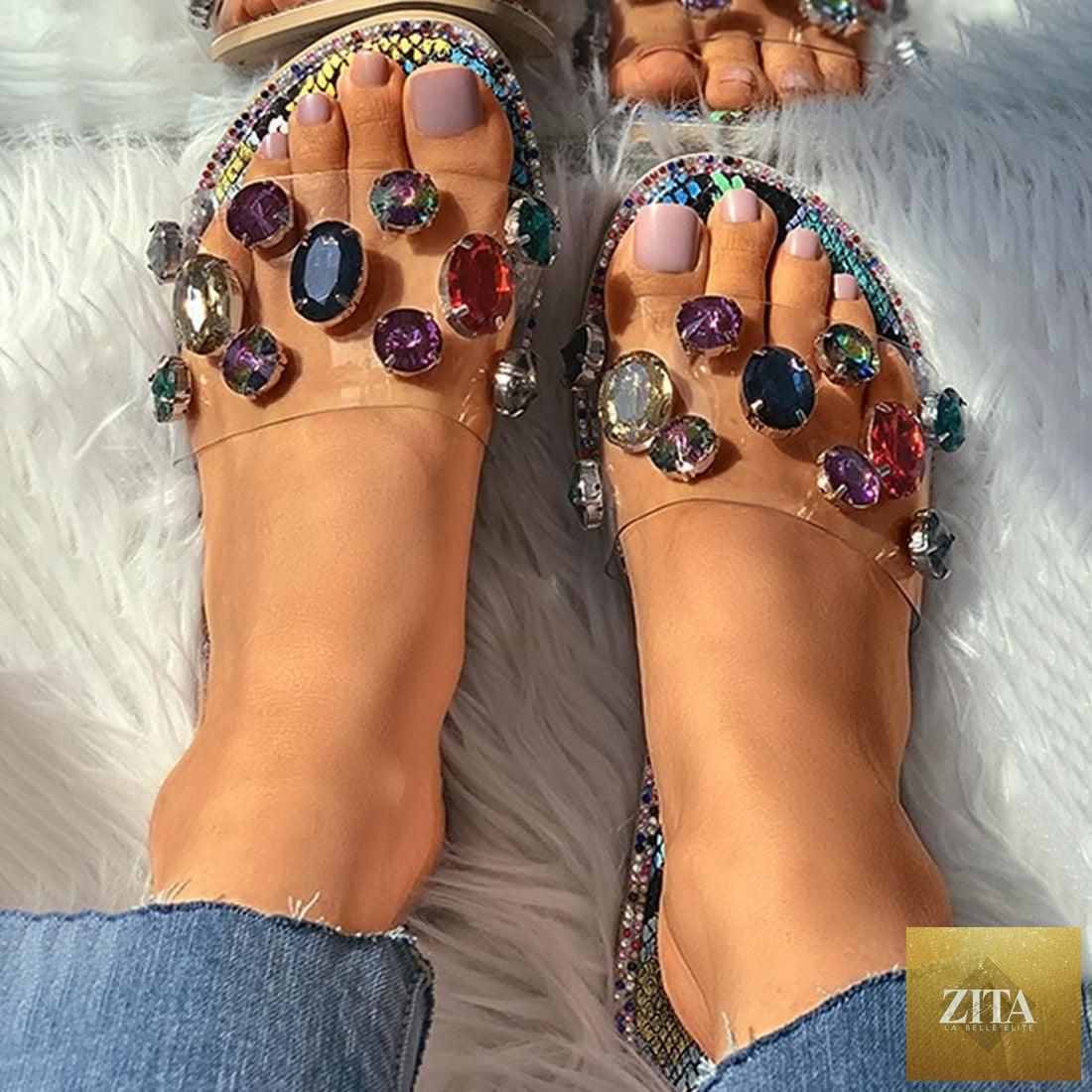 Stevvex women's flip flops with clear rhinestones, open toe flat sandals, casual slip-on style with diamond accents.