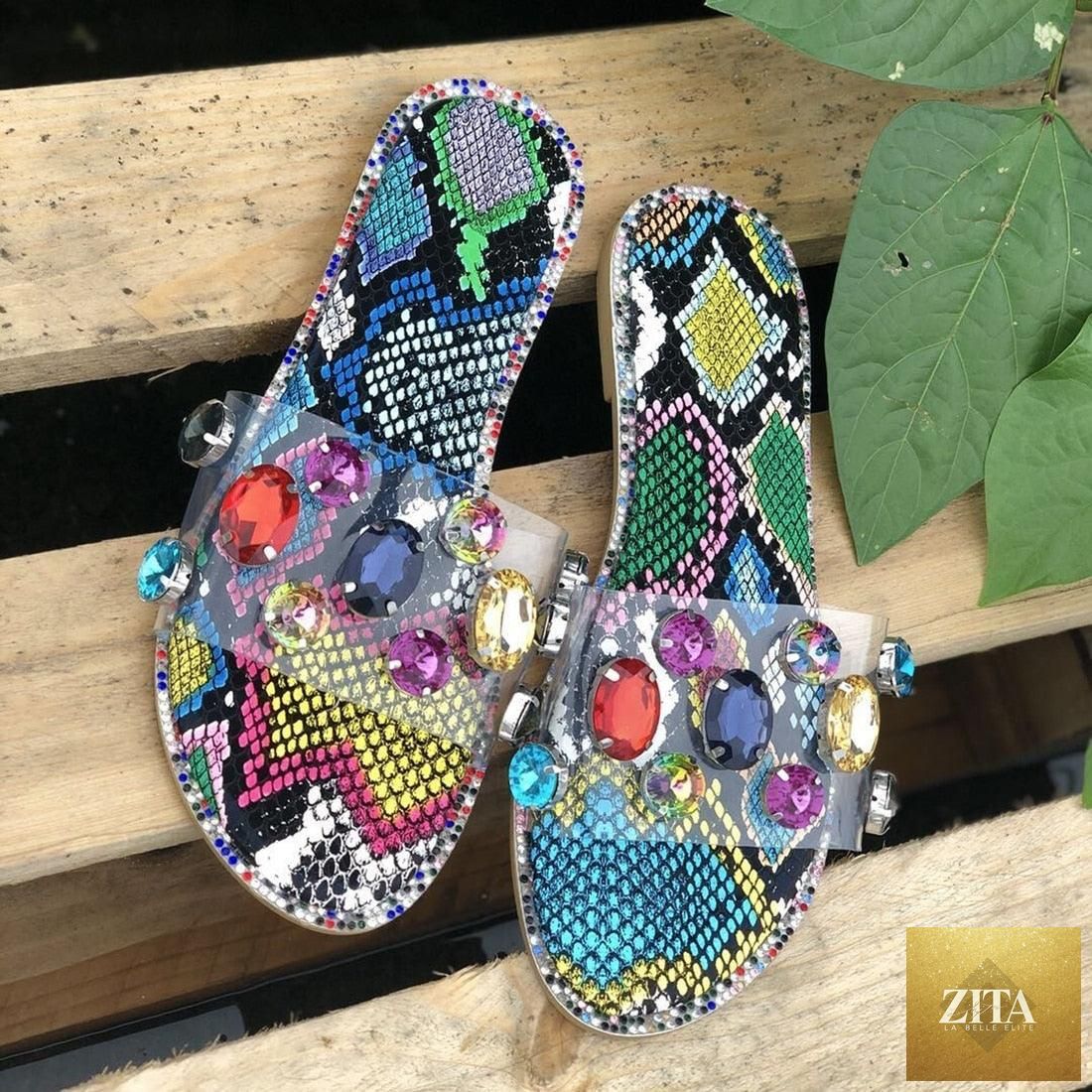 Stevvex women's flip flops with open toe design, clear rhinestones, and flat sole, ideal for casual or party wear.