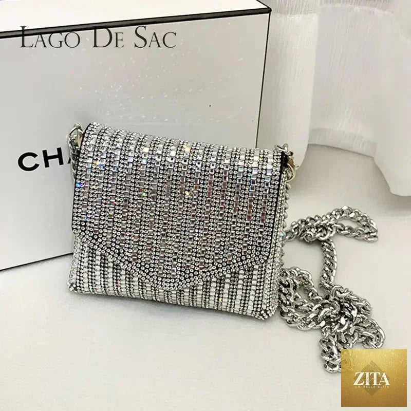 Mini rhinestone bling chain crossbody purse for women, trendy evening bag with sparkling embellishments and compact design.