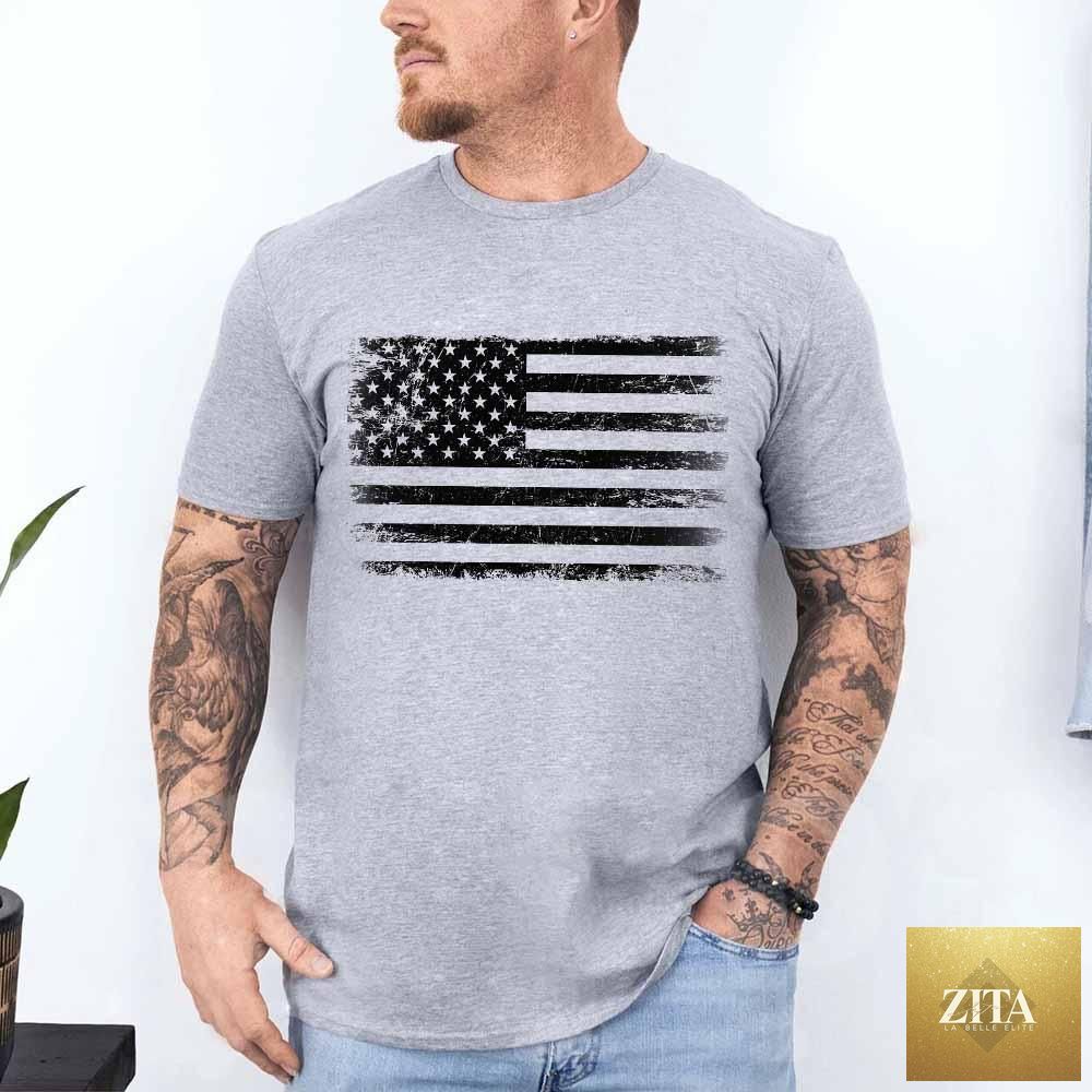 Distressed American flag design on unisex Rogue Style USA T-shirt by Adorb Custom Tees, featuring a casual fit and patriotic style.