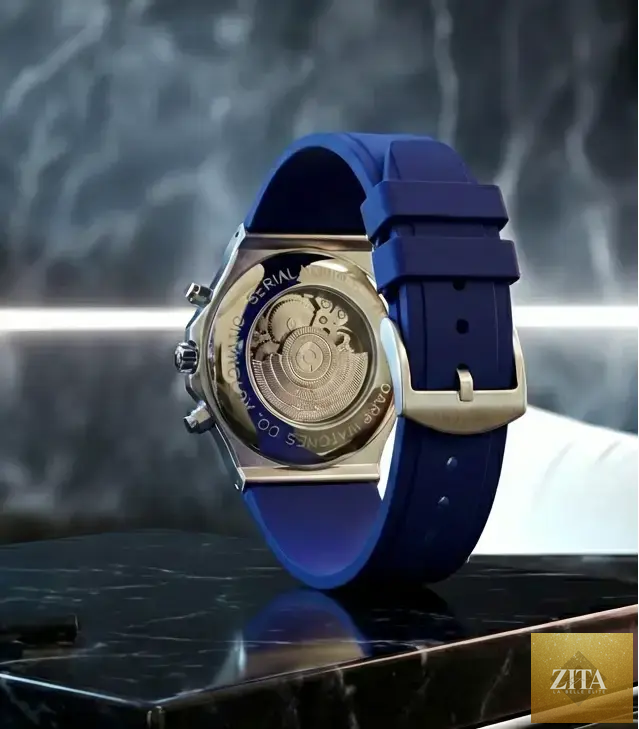 Stainless steel skeleton watch with blue dial by Dapper Watches, featuring a sleek design and visible mechanical movement.