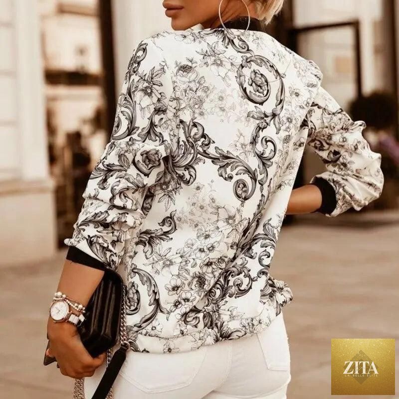 Stevvex women's long sleeve bomber jacket with a vibrant flower print, stylish zipper front, and slim fit design.