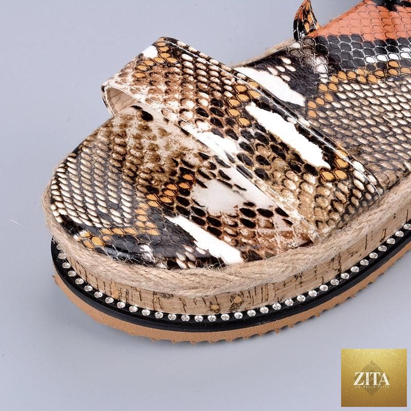 Candy-colored Stevvex women’s summer platform sandals with open toe, ankle strap, buckle, cross straps, and espadrille-style high heels.