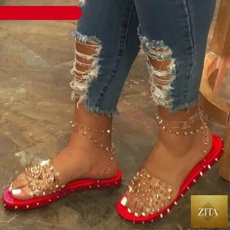 Stevvex women's summer flat sandals with transparent buckle straps, open toes, ankle straps, and adjustable buckles.