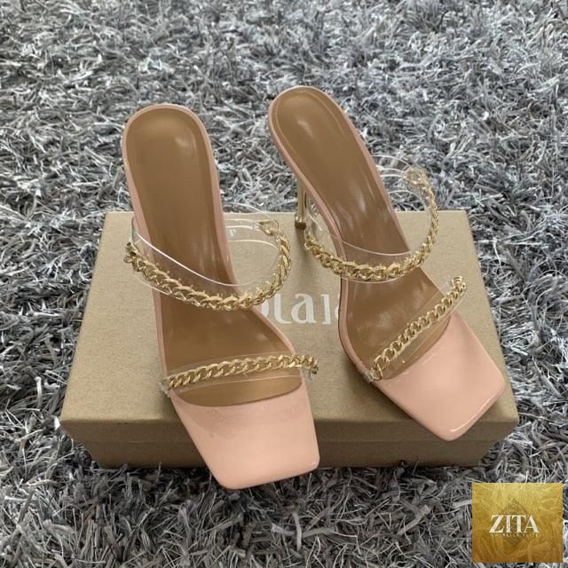 Stevvex summer women’s clear square toe high heel sandals with open toe design, slip-on style, and fashion chain detail.